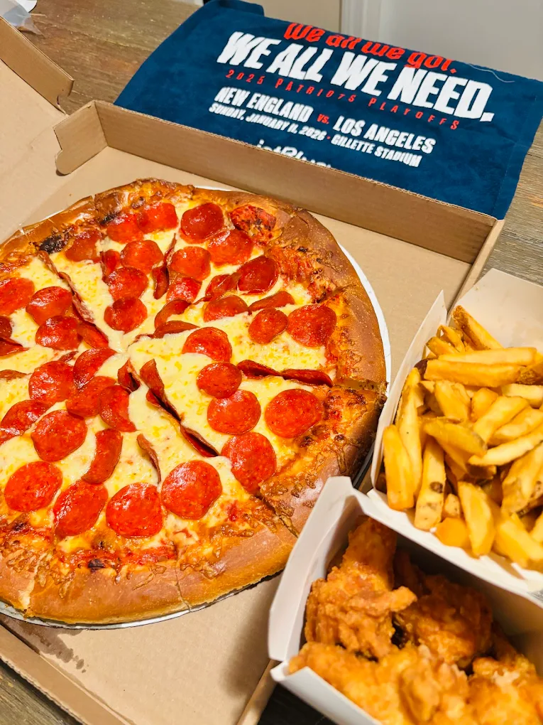 Pepperoni pizza with fries and wings