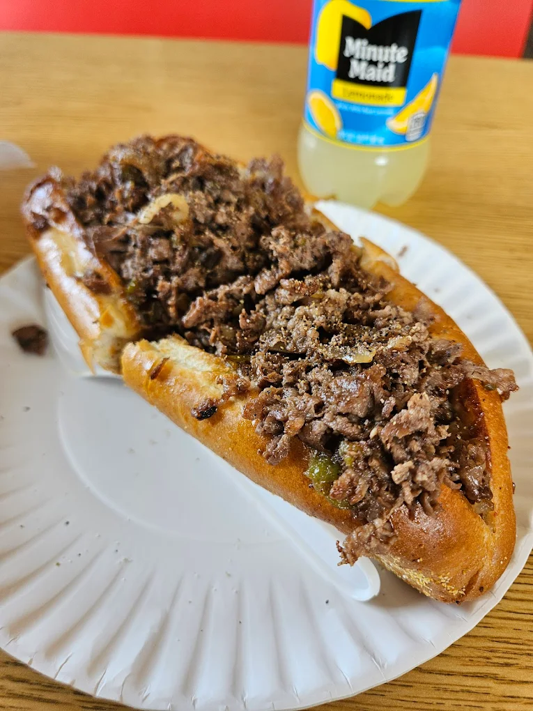 Overstuffed steak and cheese grinder